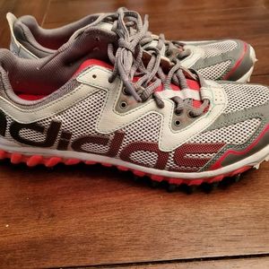 Gray Adidas athletic shoe with coral and turquoise